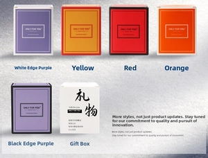 Various colored handmade aromatherapy candle gift boxes in purple, red, and yellow