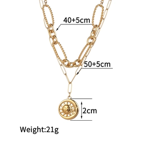Detailed view of gold double layer necklace dimensions 40+5cm and 50+5cm with sun moon pendant