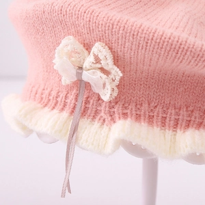 Pink knitted girls beret with white lace bow and ruffle trim, autumn pumpkin hat style