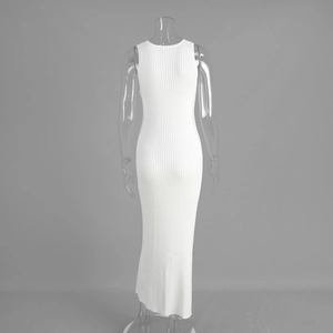 Detail shot of the back view of white ribbed knit maxi dress showing fine fabric texture