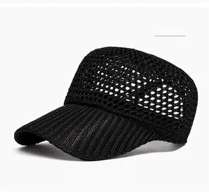 Detail view of the breathable hollow mesh structure on this black summer baseball cap