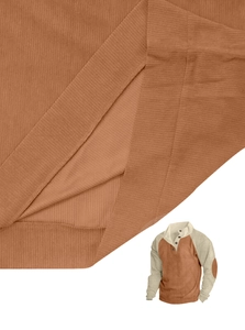 Detailed close-up of corduroy texture and stitching on a two-tone men's henley shirt