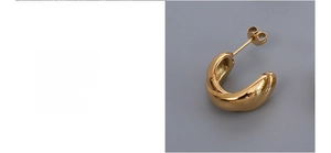 Macro view of 18K gold plated surgical titanium steel twisted C-shaped earrings