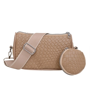 Khaki woven cylinder shoulder bag set with wide canvas strap and mini round charm
