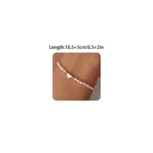 Bracciale in acciaio inossidabile placcato oro 18K con perle barocche e cuore bianco