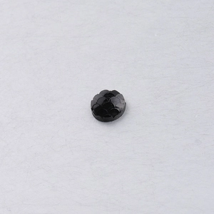 Detail of 8mm black round resin cabochon with textured fish scale pattern for DIY jewelry