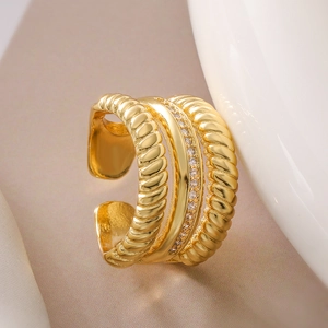 Detailed side view of 18K gold plated triple-layer open ring with twisted bands and zircons