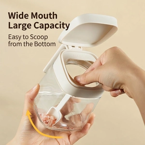 Glass seasoning jar with white flip lid and scraper for precise salt and spice measurement