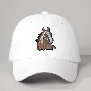 White cotton baseball cap with brown horse head embroidery and adjustable strap