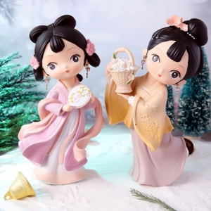 Detailed view of two Dunhuang flying fairy resin figurines in traditional Hanfu attire