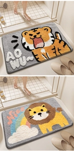Detail showing plush cartoon tiger and lion non-slip bathroom mats with soft texture