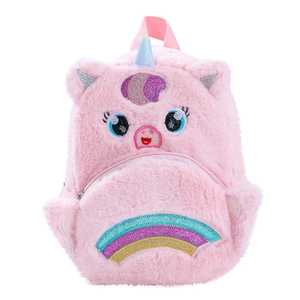 Close-up of soft pink plush unicorn backpack with glitter horn and rainbow embroidery