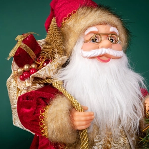 Classic red velvet Santa Claus figurine with golden gift bag and a mini Christmas tree