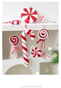 Macro detail of red and white Christmas candy cane ornaments with glitter finish