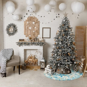 Detailed view of ocean starfish and seashell print on blue plush Christmas tree skirt