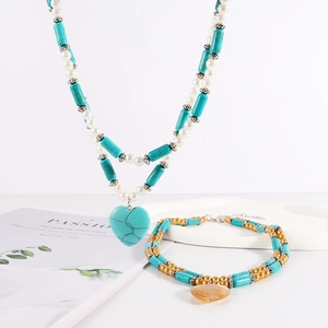 Bohemian turquoise bead necklace with heart pendant and matching beaded bracelet set