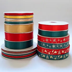 Christmas ribbon rolls with gold elk and snowflake patterns for gift box decoration