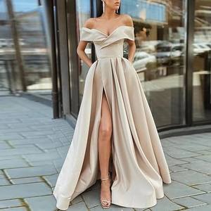 Elegant off-shoulder champagne evening gown with a high slit and pleated satin finish