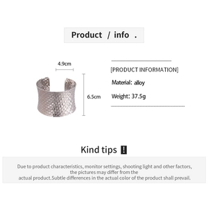 Detailed view of silver braided wide cuff bracelet with dimensions 4.9cm and 6.5cm