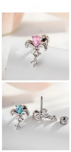 Macro detail of fleur-de-lis earrings with water-drop zircons and screw-back closures
