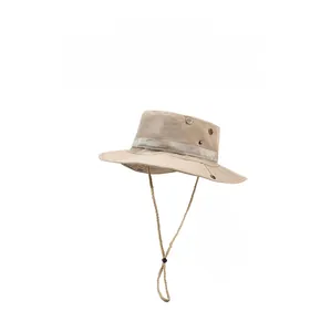 Macro shot of beige fishing hat fabric with metal vents and adjustable chin strap