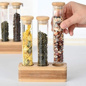 Vertical glass storage tubes with bamboo rack for coffee beans and tea display