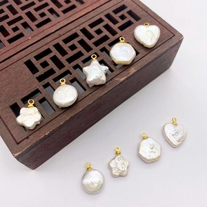 Natural freshwater pearl pendants in star and heart shapes with gold metal connectors