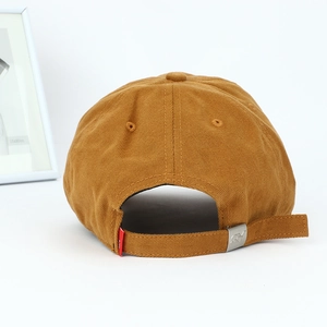 Detailed back view of caramel cotton baseball cap with adjustable metal slider buckle