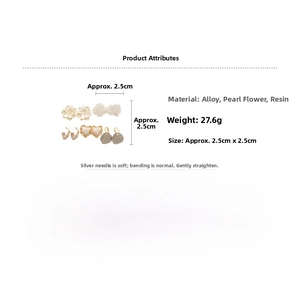 Detail view of flower and heart earrings set with pearls and resin dimensions shown
