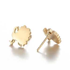 Detailed view of golden turkey-shaped stainless steel stud earrings for women