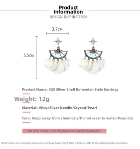 Detailed view of Bohemian earrings with shell discs and size specs 5.5cm x 3.7cm