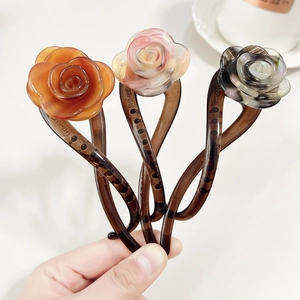 Elegant acetic acid rose flower hair clips in amber, pink and grey colors