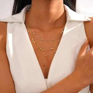 Three-layer gold and silver beaded oval chain necklace for women in elegant minimalist style
