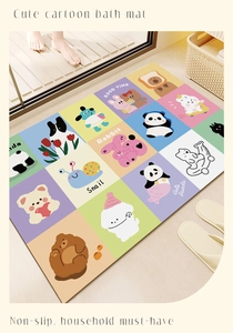 Detail of cute cartoon animal bath mat featuring non-slip squares for bathroom safety