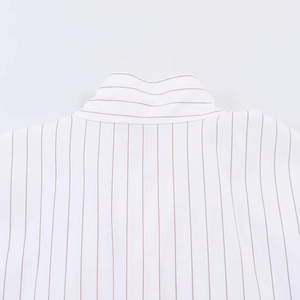 Detailed macro view of shirt back collar and striped poplin fabric texture