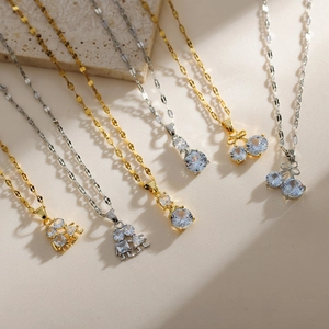 Elegant cherry-style necklaces featuring gold and silver finish with zircon pendants