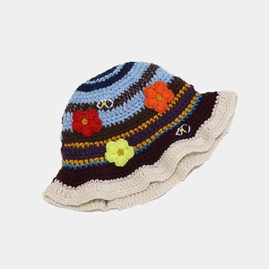 Handmade crochet bucket hat with colorful stripes, floral accents and wavy brim