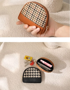 Mini canvas coin purse with houndstooth pattern showing card slots and key storage