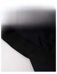 Detail shot of the widened sweatband and interior stitching of the black cotton baseball cap