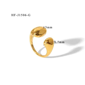 Polished gold irregular open ring with 13mm and 8.7mm teardrop sphere details