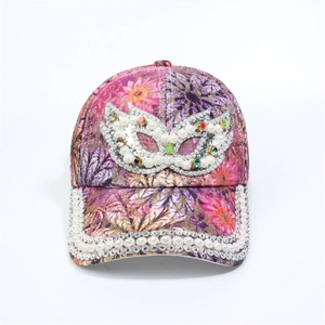 Detailed view of floral baseball cap with colorful rhinestones and faux pearls mask pattern