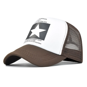 Detail view of the star pattern and lyric print on the brown mesh trucker hat