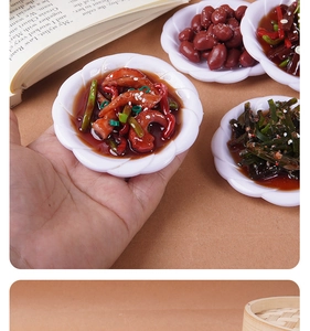 Detailed macro view of 8cm miniature realistic resin Chinese food dish model on palm