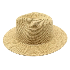 Detailed top view of a flat-top Panama boater hat with natural woven straw texture
