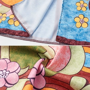 Detail of floral print swimsuit with precise overlock stitching and soft fabric texture