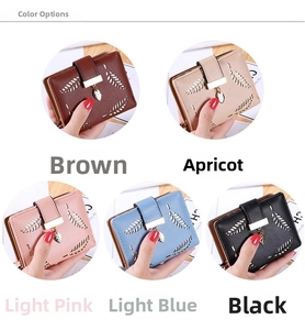 Detail view of five colors of leaf hollow wallets with metal leaf pendants and magnetic clasps