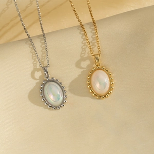 Elegant gold and silver titanium steel necklaces with iridescent oval shell pendants