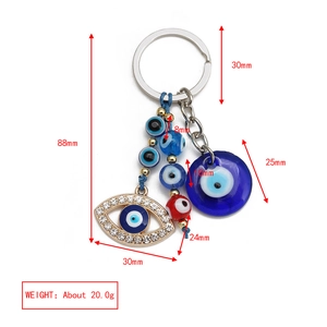 Detailed size chart for the blue evil eye keychain and hamsa hand lucky charm