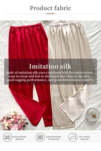 Detail of red and champagne silk pajama pants showing fabric texture and care guide