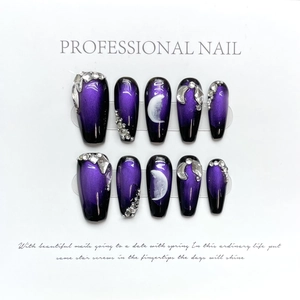 Faux ongles faits main œil de chat violets avec lunes, strass et perles